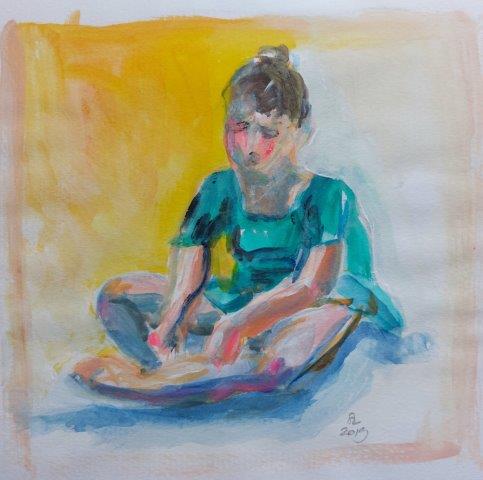 Girl seated with turquoise leotard